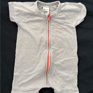 Bonds Lilac Short Sleeve Wonder Suit with bight Coral Zip